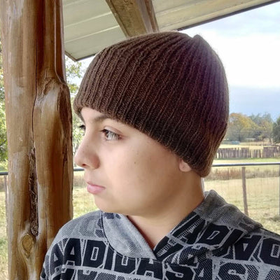 Bison Beanie with polar fleece lining; model is 11 yrs old