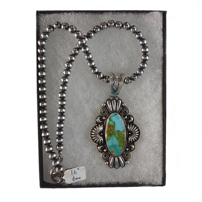 Royston Turquoise Pendant by Silversmith, Derrick Gordon