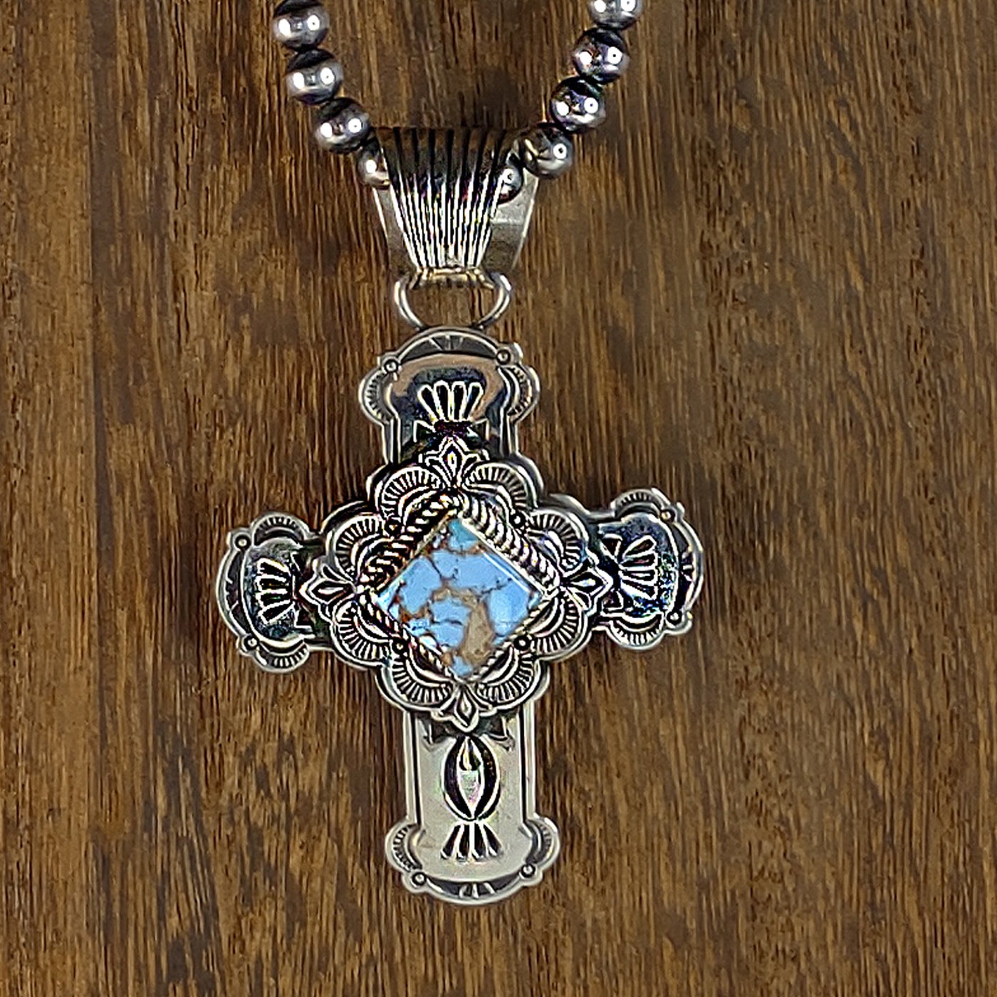 Cross Pendant with turquoise by Silversmith, Albert Jake