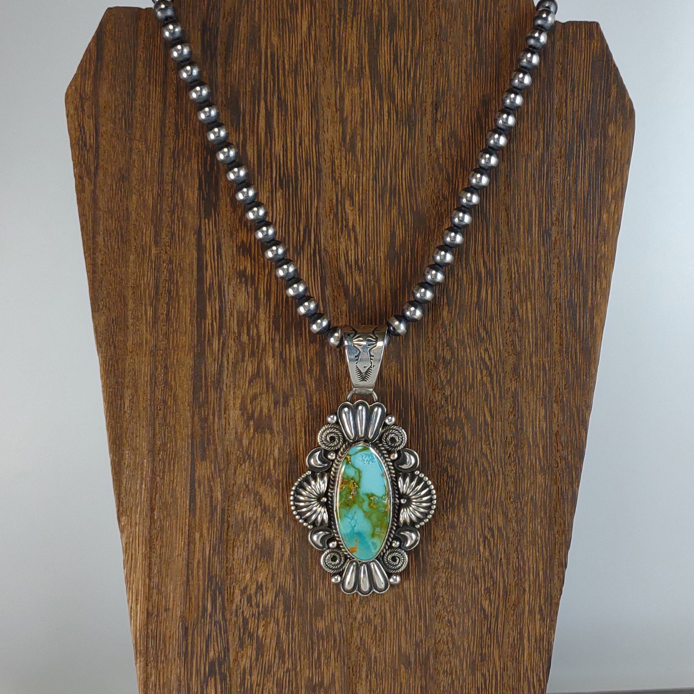 Royston Turquoise Pendant by Silversmith, Derrick Gordon